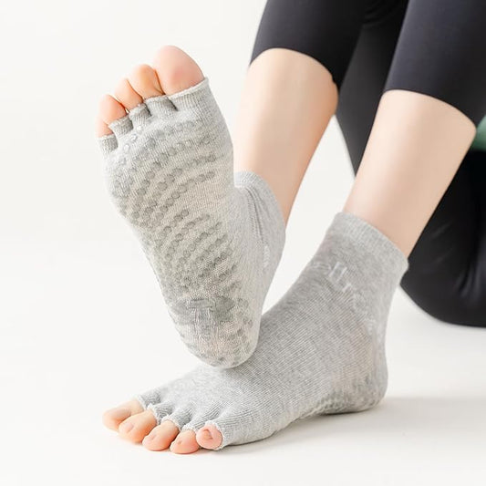 woman wearing Gray toeless grip socks for Pilates, barre and yoga