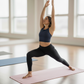 Woman practicing yoga in a yoga studio on wellrox mat towel