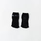pair of black non-slip, toeless yoga socks